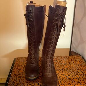 UGG Leather tall boots with Sherpa lining.